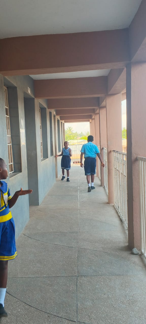 Students walking through the school corridor